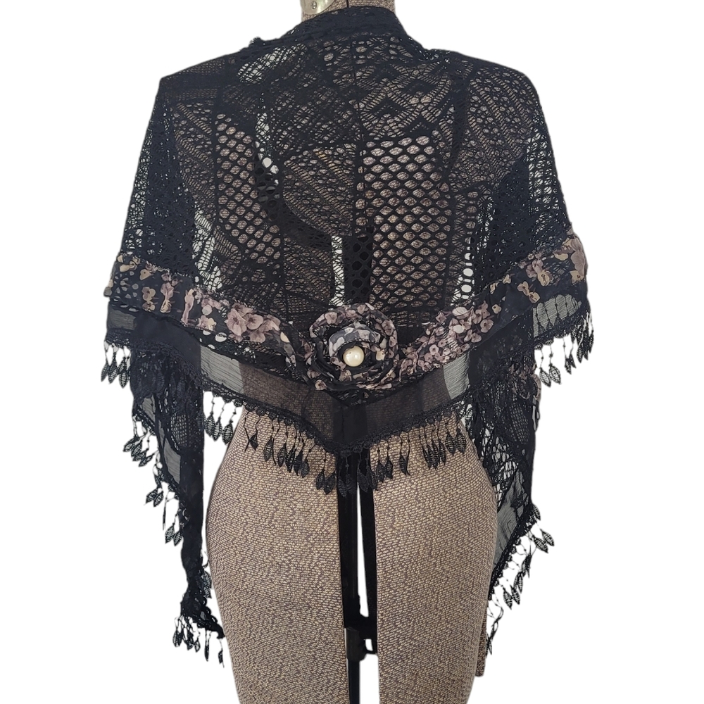 Black crochet shawl with floral embelishement and fringe